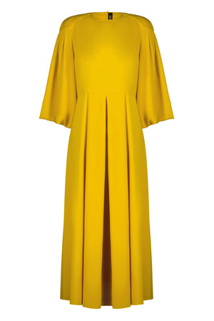 Жовта сукня міді